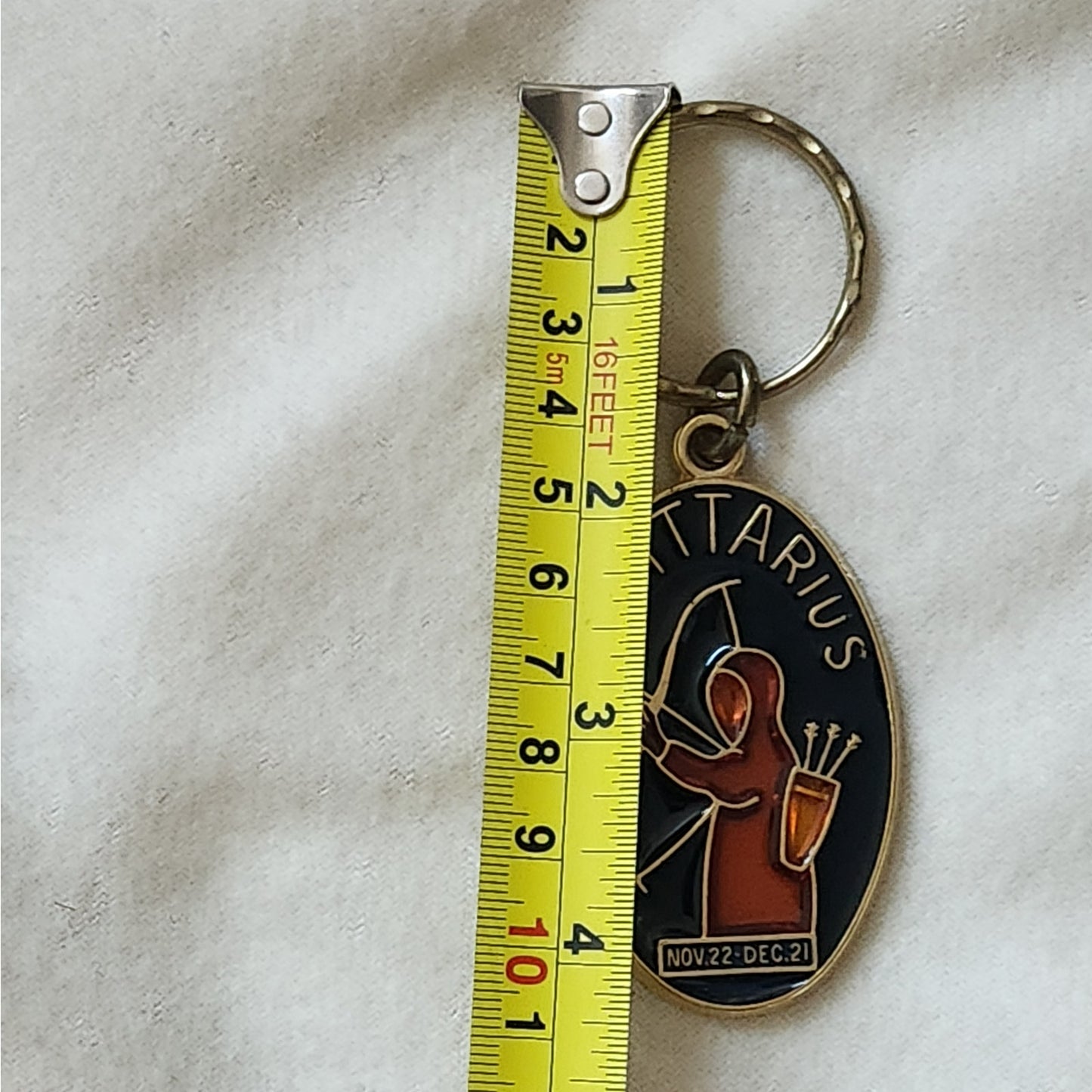 1970s Enamel and Brass Sagittarius Key Ring