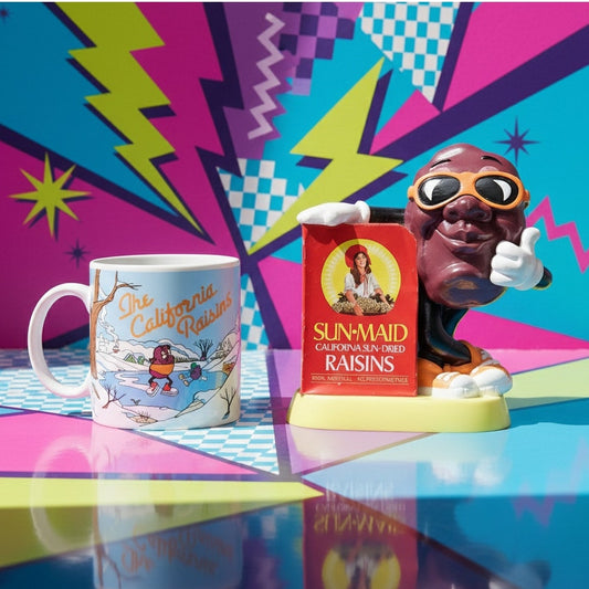 Vintage California Raisins Gift Bundle – 1988 Winter Mug + 1987 Sun-Maid Raisin Piggy Bank | Retro Kitchen Decor | 80s Nostalgia Collectible Set