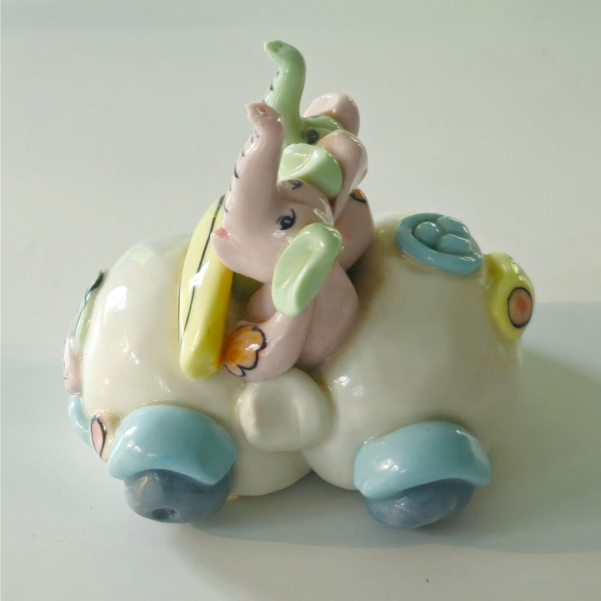 Vintage Ceramic Elephant Car Figurine