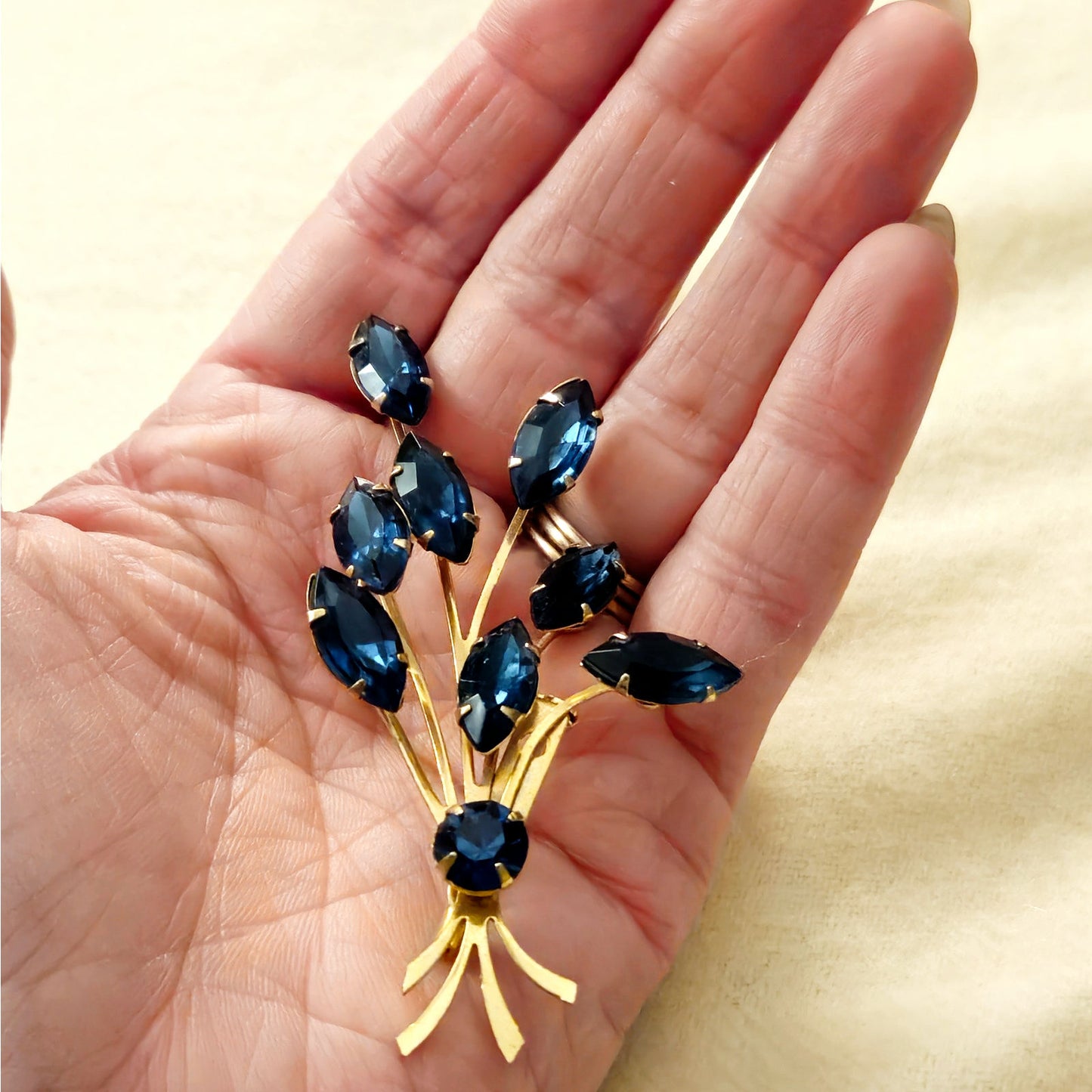 Vintage Blue Rhinestone Spray Brooch | Mid Century Sapphire Gold Navette Pin