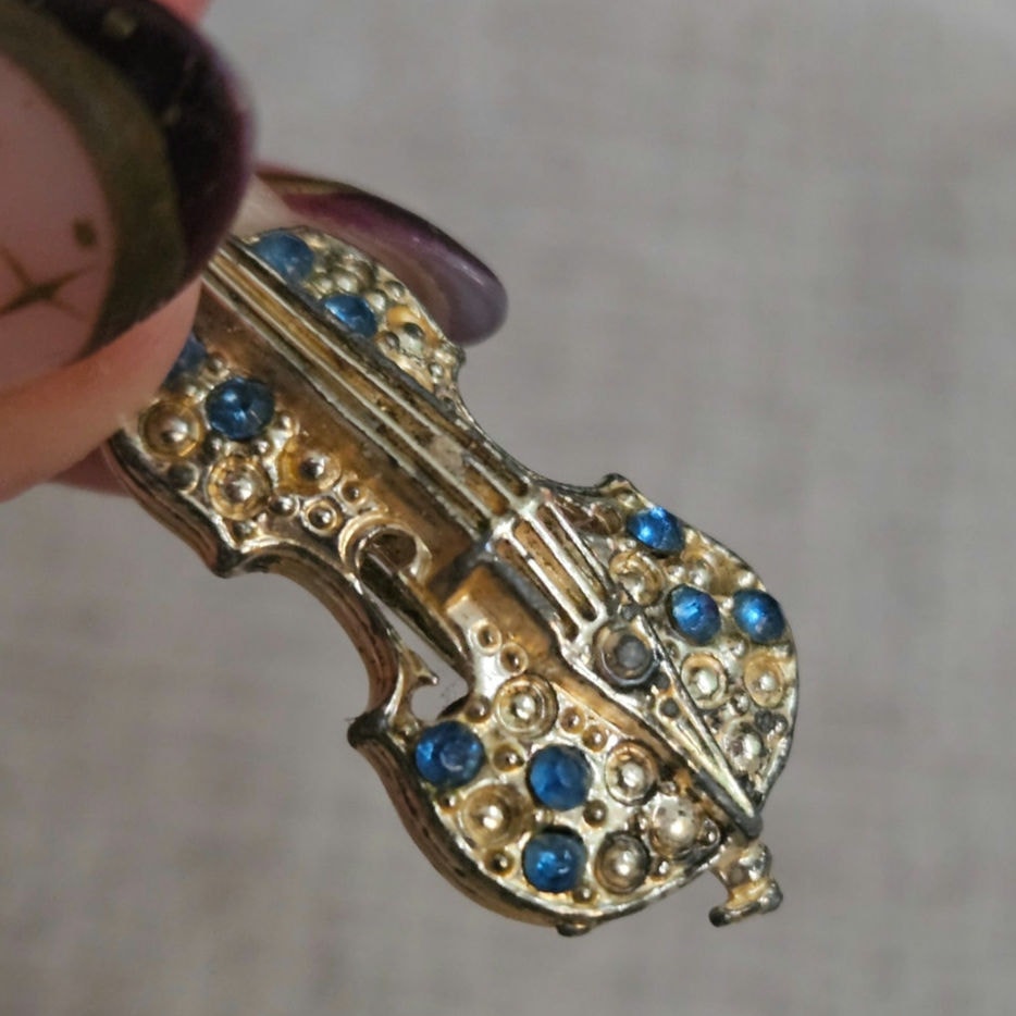 Mid-Century Gold Tone Violin Brooch with Blue Rhinestones