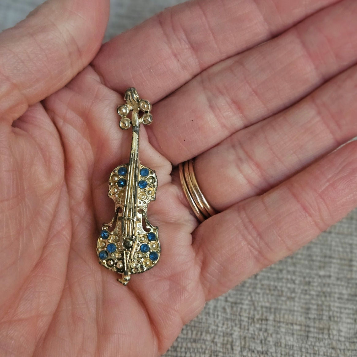 Mid-Century Gold Tone Violin Brooch with Blue Rhinestones